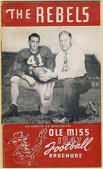 Two-color vintage college game day program cover of 1947 Ole Miss media guide featuring Charlie Conerly (left) and coach Johnny Vaught (right). Courtesy of a kind uploader to Wikimedia Commons who shared it.