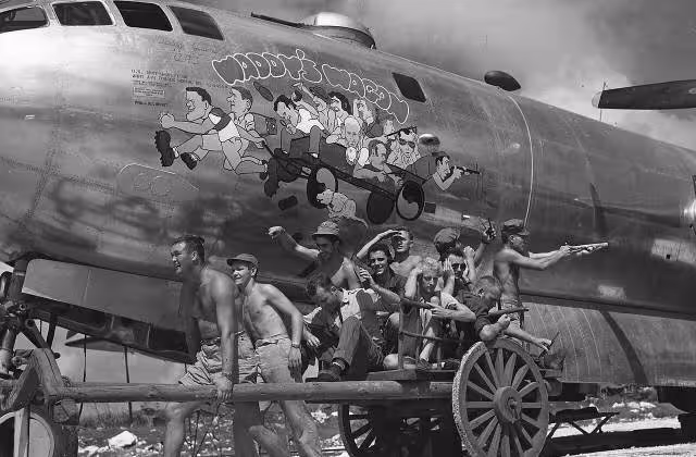 Young (far left, pulling wagon) and his B-29 crew "Waddy's Wagon"