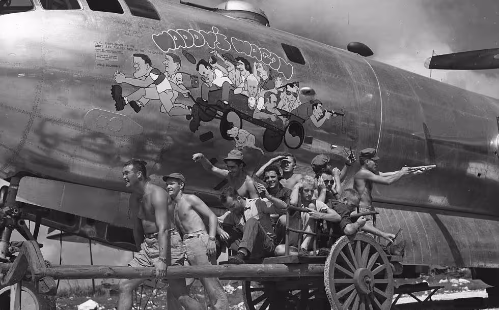 Young (far left, pulling wagon) and his B-29 crew "Waddy's Wagon"