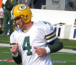 Full color image of Brett Favre in a white Green Bay Packers number 4 uniform. Favre in 2006 Photo taken and uploaded by PSUMark2006 at en.wikipedia - Originally from en.wikipedia; description page is/was here Green Bay Packers quarterback Brett Favre during on-field warmups at Ralph B. Wilson Stadium in Orchard Park, New York, prior to a game against the Buffalo Bills on November 5, 2006.