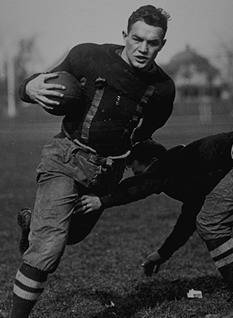 b/w image of Ohio State's Chic Harley in action circa 1919.
