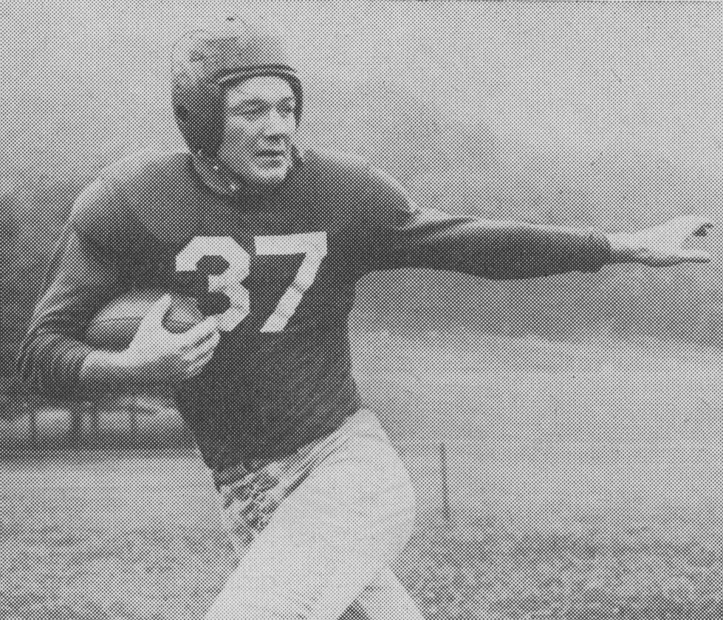 B/W vintage publicity posed photo of George Franck (1918–2011), back for the New York Giants of the National Football League, 1947. Photographer uncredited. Published in Walter Collier (ed.), Redskin Review: The Redskins vs. New York Giants, Griffith Stadium, Washington, DC, Oct. 12, 1947; p. 23.