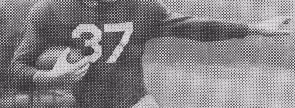 B/W vintage publicity posed photo of George Franck (1918–2011), back for the New York Giants of the National Football League, 1947. Photographer uncredited. Published in Walter Collier (ed.), Redskin Review: The Redskins vs. New York Giants, Griffith Stadium, Washington, DC, Oct. 12, 1947; p. 23.