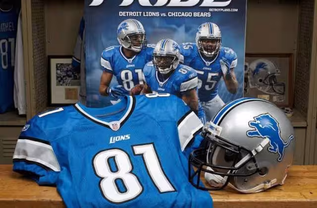 Gemini AI-created image of a 2011-era Detroit NFL American football jersey 81, without a name on it, and a matching period-correct helmet, the program cover appropriate to the era and team.