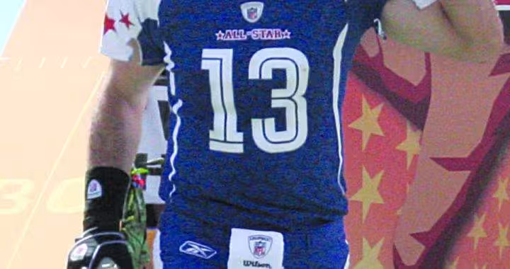 Kurt Warner waves to the 50,000 in attendance at the NFL Pro Bowl Sunday as he and the rest of the NFC Champion Arizona Cardinals were introduced. Warner was the starting quaterback for the NFC team.