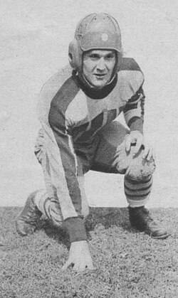 A vintage b/w pose for publicity of Montgomery in 1932, in a 3-point stance.