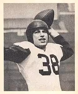 b/W publicity image of Minisi on a 1948 Bowman football card, throwing a football.