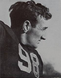 Black and white vintage image of Tom Harmon 1948 via the Michiganesia a kind uploader to Wikimedia Commons who shared it.