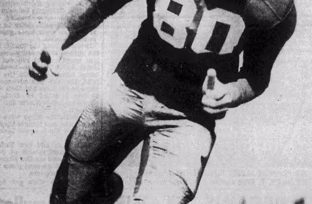 Vintage b/w publicity posed American football player Donn Moomaw, circa 1951, released into the public domain,uploaded to Wikimedia Commons by a contributor.
