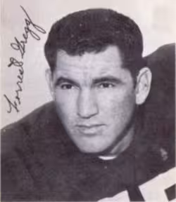 Black and white autographed image of 1963 stamp of Forrest Gregg for Green Bay Packers.