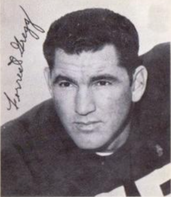 Black and white autographed image of 1963 stamp of Forrest Gregg for Green Bay Packers.