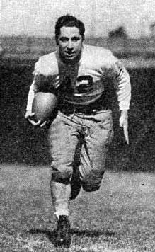b/w action publicity pose of Goldberg with the Pittsburgh Panthers in 1938