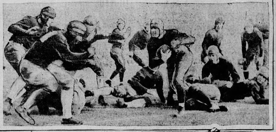 Vintage b/w newspaper image of Harry Stuhldreher carries ball against Stanford in Rose Bowl, Jan. 1, 1925.jpg Caption text says "Harry Stuhldreher, Notre Dame quarterback and all-American in the position on most of the team picked by the critics, is shown here carrying the ball in the New Year's day game between Notre Dame and Stanford in the Rose bowl at Pasadena, Cal. Evidently he did not gallop far as his foot slipped out of bounds as the photo was snapped and as three husky Cardinals (at the left) charged him. Apparently it was an out-of-bounds play by Notre Dame, so that the latter could get the ball fifteen yards from the sideline." The Des Moines Register