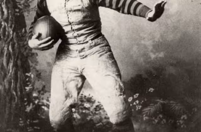 John Heisman posing as football player while at Penn, 1891.