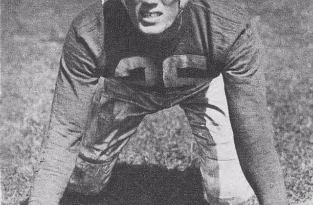 Bruiser Kinard 1940 in a 4-point stance with leather helmet.