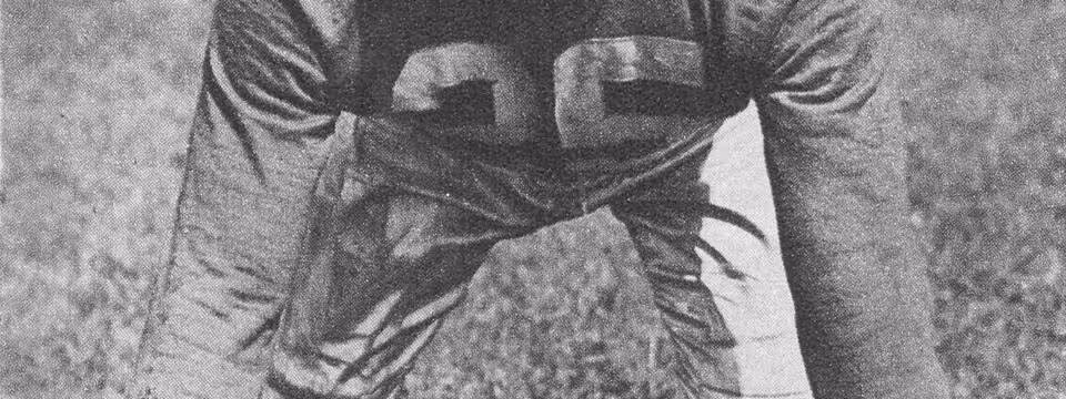 Bruiser Kinard 1940 in a 4-point stance with leather helmet.
