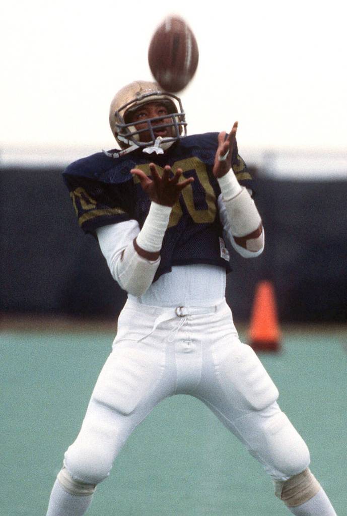 US Naval Academy Midshipman First Class Napoleon "Nap" McCallum practices with a coach. An All-American football player and a sixth-place finisher in the 1983 Heisman Trophy contest, McCallum holds 16 Naval Academy football records. Location: Annapolis, Maryland