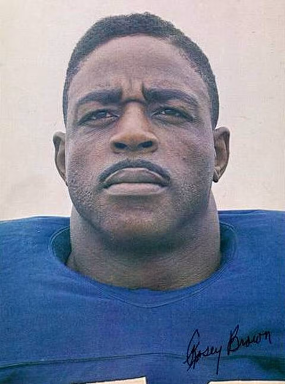 Color publicity head shot of Professional football player Rosey Brown in his blue New York Giants jersey