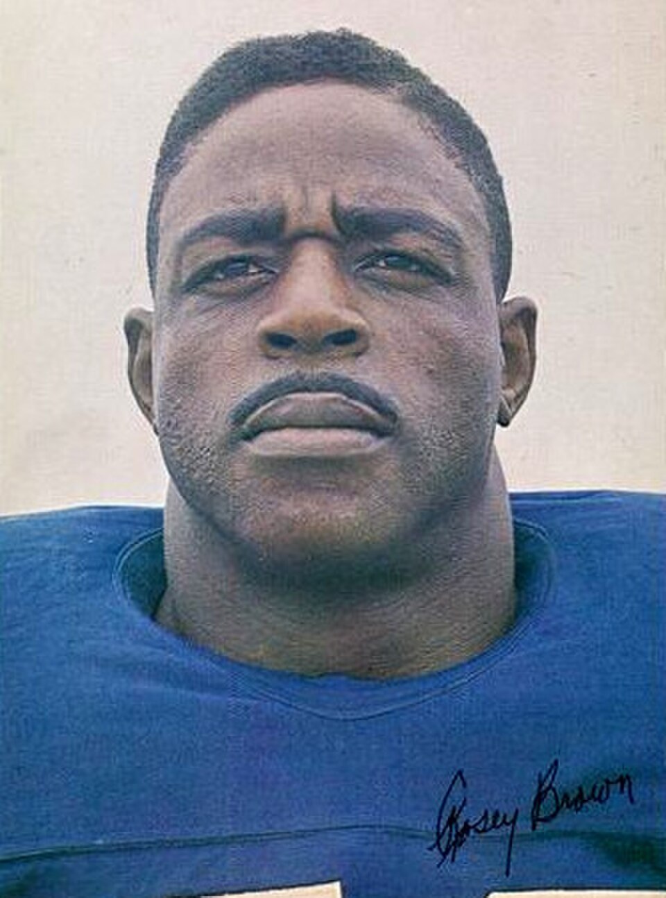 Color publicity head shot of Professional football player Rosey Brown in his blue New York Giants jersey