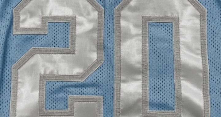 light Blue football jersey number 20 in white letters.