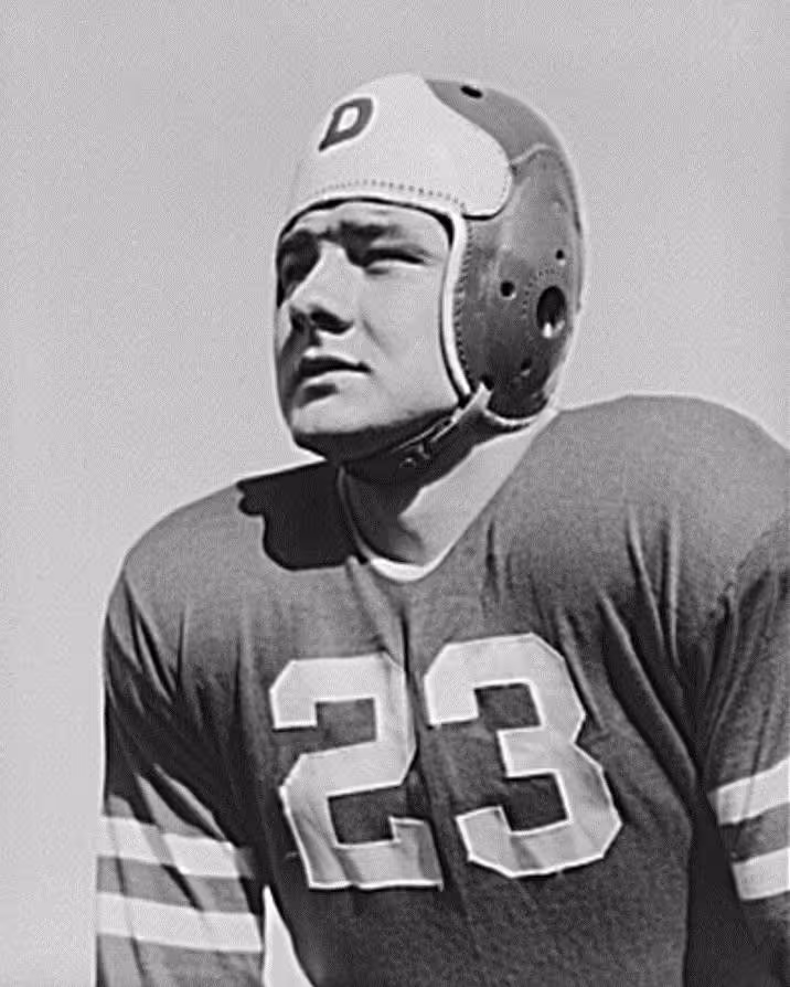 Black and white publicity photo of Vince Banonis in his number 23 football uniform, complete with a leather helmet embrazened with a "P"