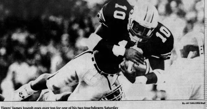 News clipping of Auburn RB diving for a TD