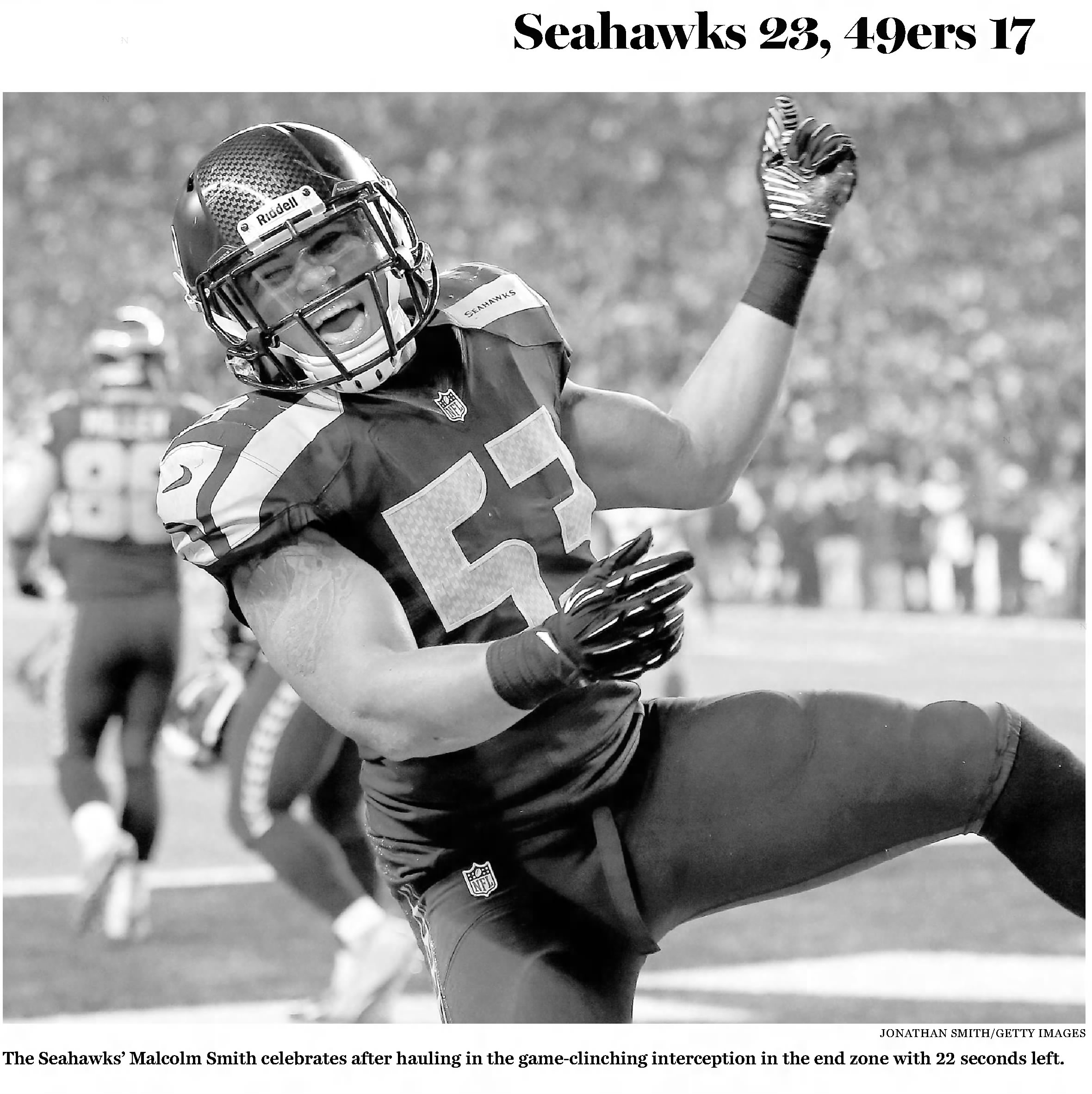 b/w newspaper image of Seattle's Malcolm Smith celebrating