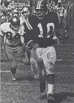 Loria wearing number 10 running with ball