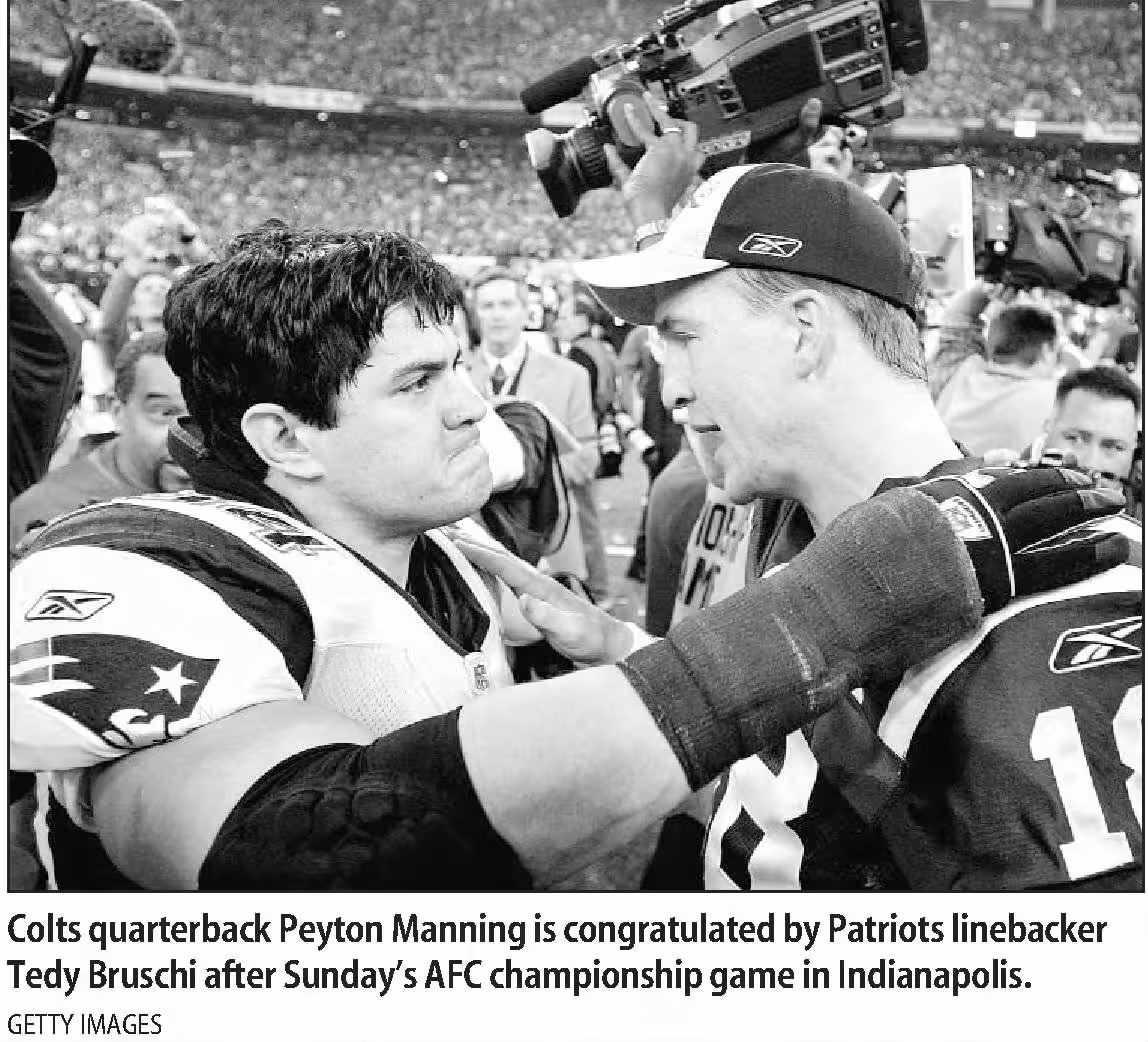 b/w newspaper post after the 2007 AFC Championship game Ted Bruschi_and_Peyton Manning