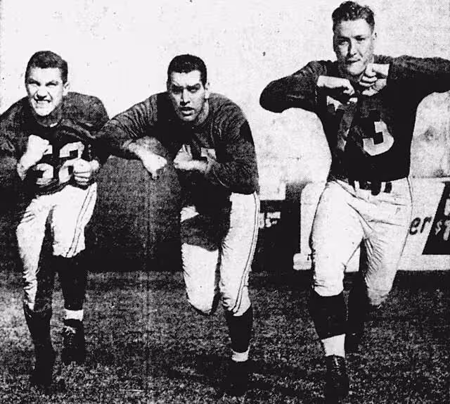 b/w newspaper image of American football players Lou Creekmur (left), George Connor (center) and Jim Winkler (right) in 1953 in publicity poses