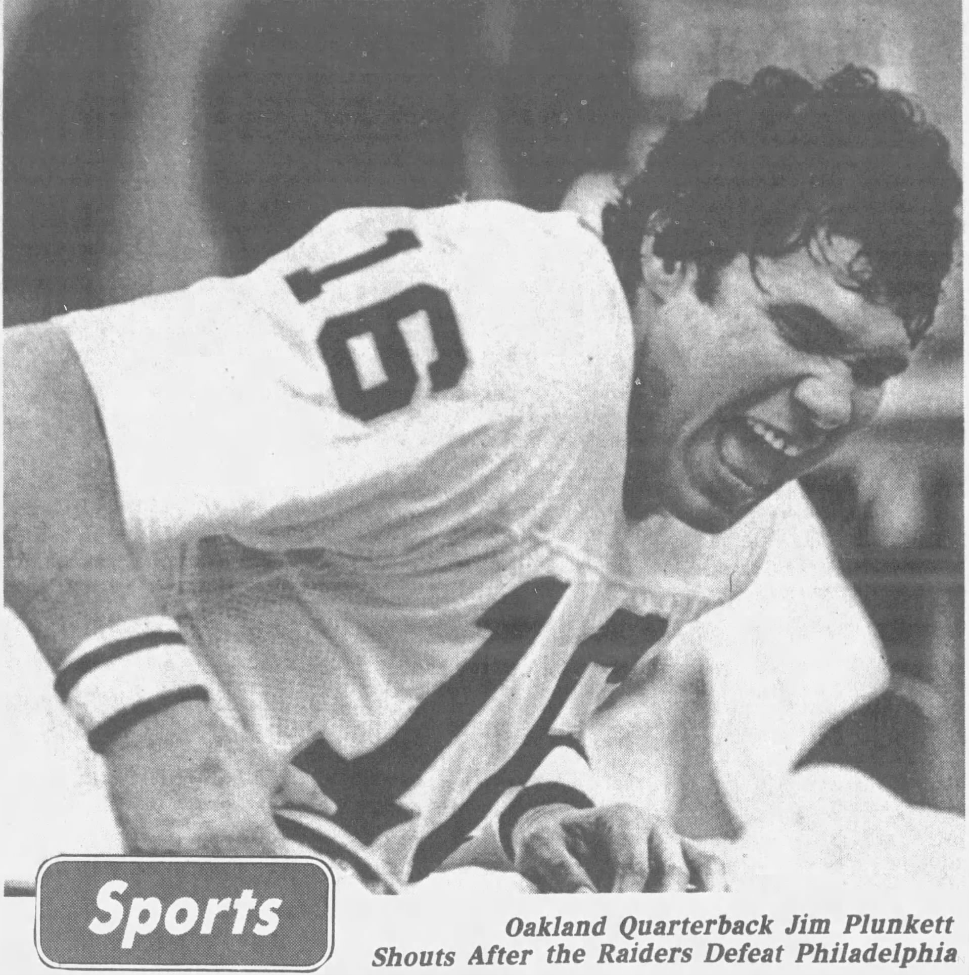 b/w newspaper image of Jim Plunkett in Oakland Raiders uniform #16 in 1981 shouting after a victory