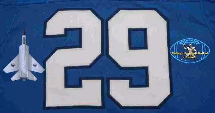 Image of a light blue with white numerals AF football Jersey number 29 rendering with PD College football HOF emblem.