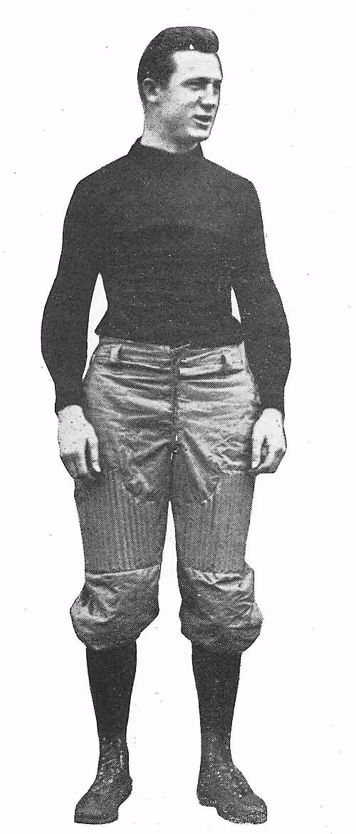 black and white full body image of Bill Hollenback in his 1910 Missouri football uniform