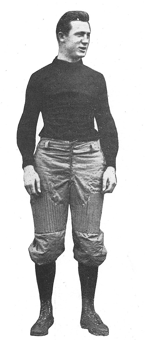 black and white full body image of Bill Hollenback in his 1910 Missouri football uniform