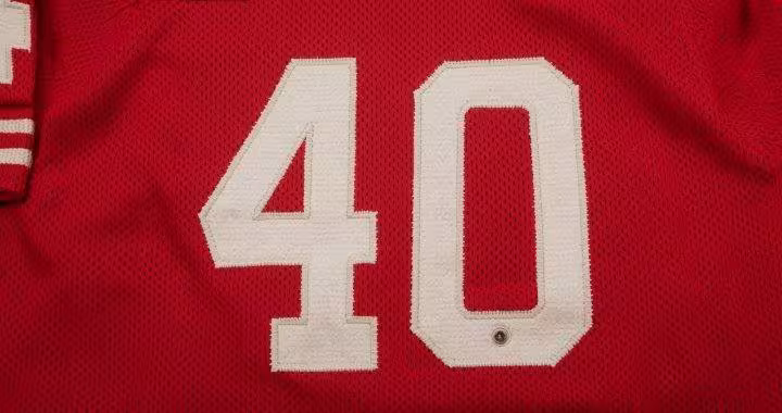 Image of a red with white numerals football Jersey number 40 rendering.