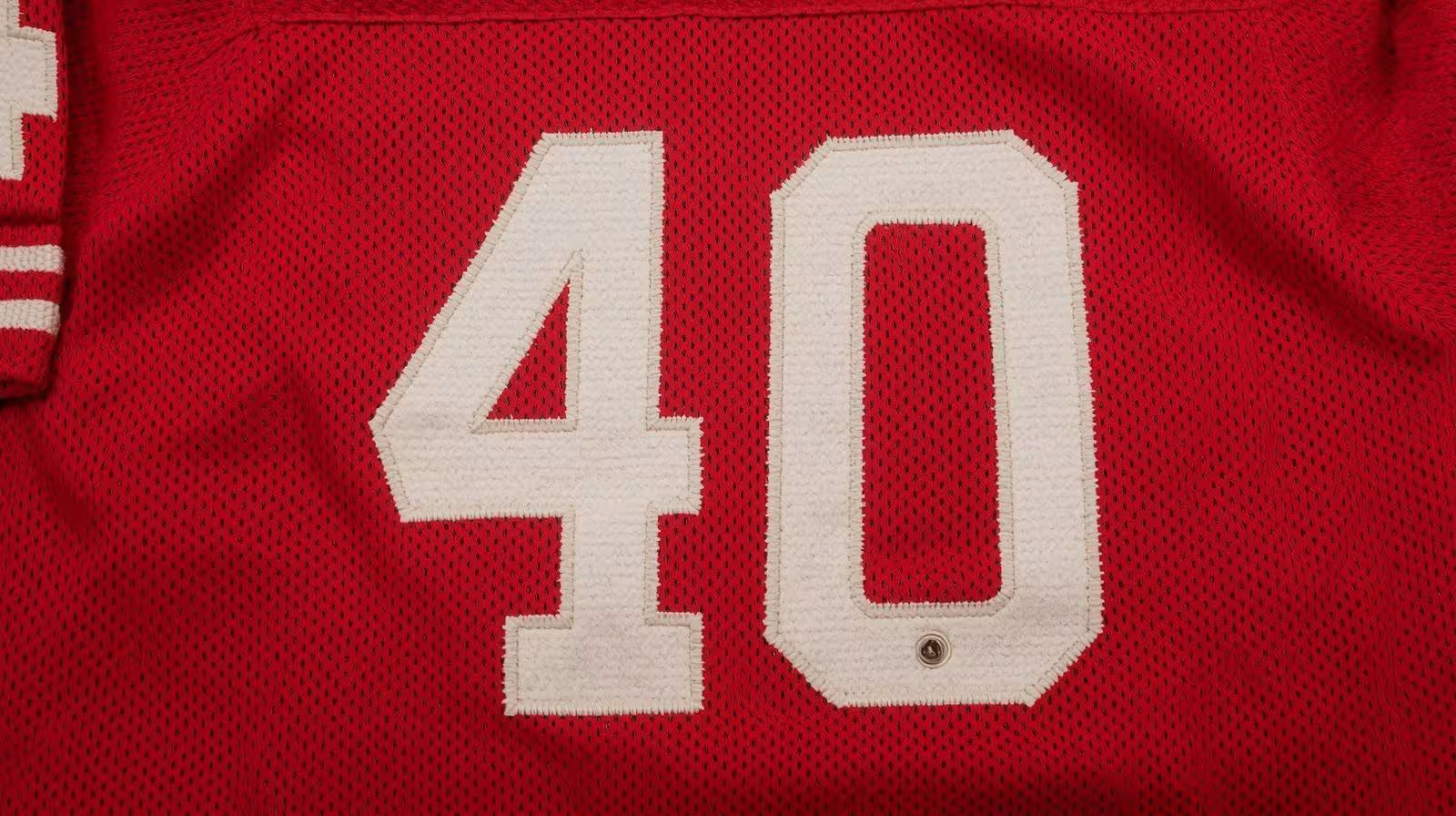 Image of a red with white numerals football Jersey number 40 rendering.