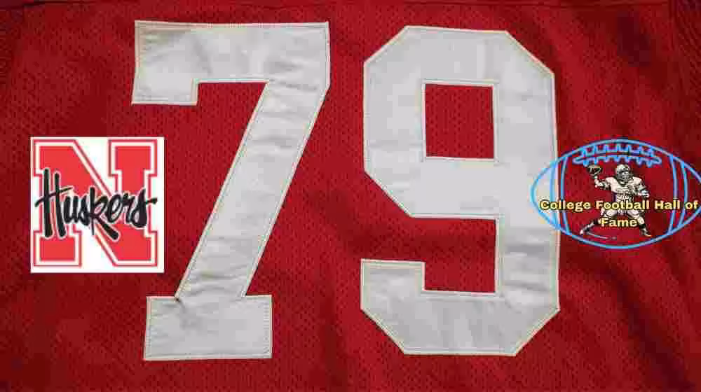 Image of a red with white numerals Nebraska football Jersey number 79 rendering with PD College football HOF emblem.