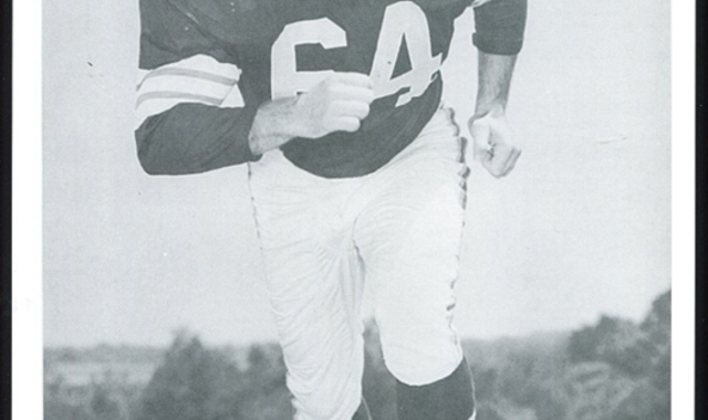 black and white publicity pose for Jim Ray Smith in his full Cleveland Browns uniform number 64 minus helmet