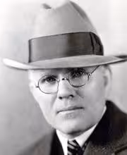 black and white image of former NFL president Joe Carr in a fedora 1920