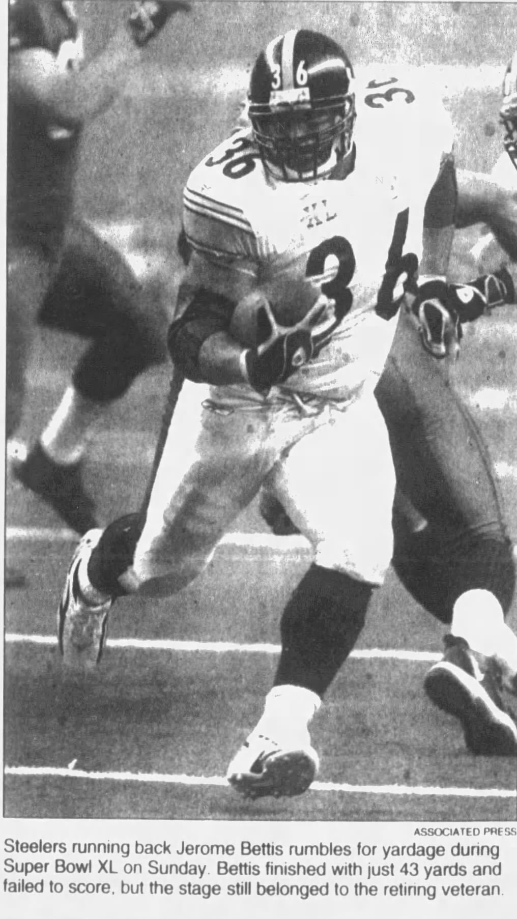AP black and white photo image of Steelers number 36 Jerome Bettis wears his white jersey running during Super Bowl XL