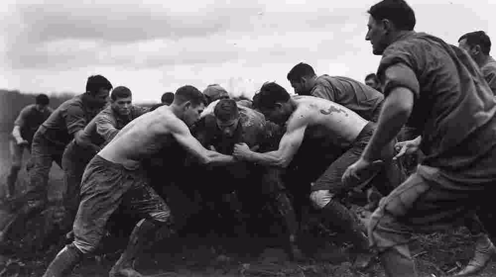 black and white AI rendered game action image of early 20th century American football players