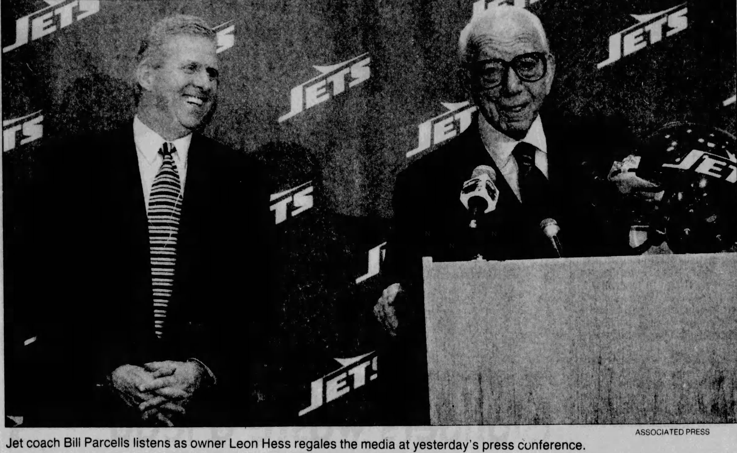 black and white newspaper AP image of Jets owner Leaon Hess introduces Bill Parcells and the teams new head coach 1997