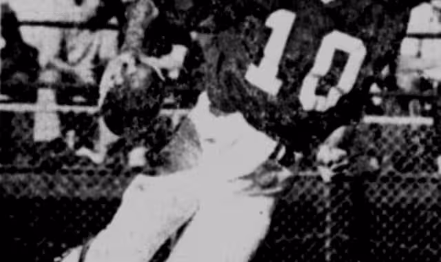 an action shot in black and white of Former Minnesota Vikings QB Fran Tarkenton on January 9, 1974