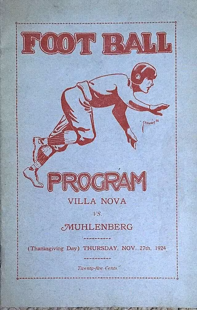 A vintage, two-tone football program cover from Thanksgiving Day, November 27, 1924. The design features a red line illustration of a football player in a low, lunging athletic stance, wearing a leather helmet, quilted trousers, and high-top cleats. The text, printed in red on a light blue-grey background, reads 'FOOT BALL PROGRAM,' 'VILLA NOVA vs. MUHLENBERG,' and 'Twenty-five Cents.' A decorative dotted border frames the entire cover.