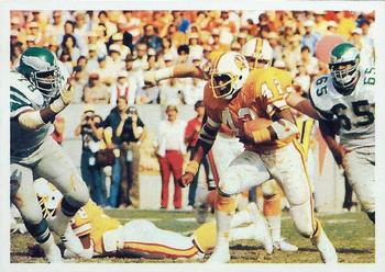 The image is a high-action shot characteristic of the 1979 Topps set. It features Buccaneers running back <a rel=