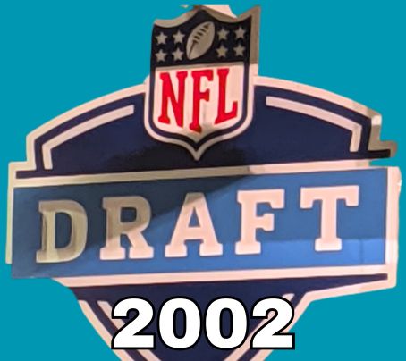 NFL Draft sign in color on a aqua background with the year 2002 text across the bottom in bright green. Original cropped image was taken by Darin Hayes at AT&T Stadium in 2022.