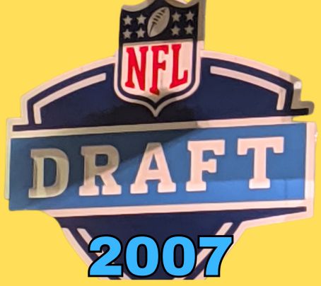 NFL Draft sign in color on a yellow background with the year 2007 text across the bottom in blue. The original cropped image was taken by Darin Hayes at AT&T Stadium in 2022.