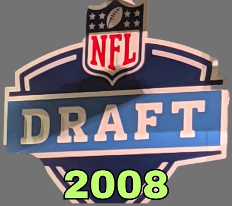 NFL Draft sign in color on a gray background with the year 2008 text across the bottom in bright green. The original cropped image was taken by Darin Hayes at AT&T Stadium in 2022.