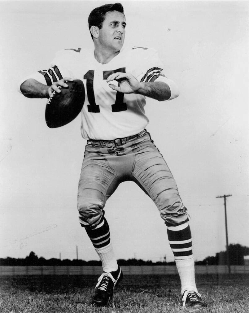 Vintage black and white photo of Dallas Cowboys quarterback Don Meredith #17. Meredith is shown in a passing stance on a practice field, wearing a classic 1960s Cowboys jersey for historical NFL research and Pigskin Dispatch archives.