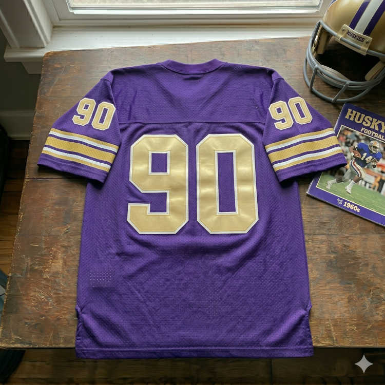 Vintage Washington Huskies #90 football jersey. Purple mesh with gold and white block numbers, 1960s Husky game program, and gold helmet for historical Pac-12 sports research and Pigskin Dispatch archives.